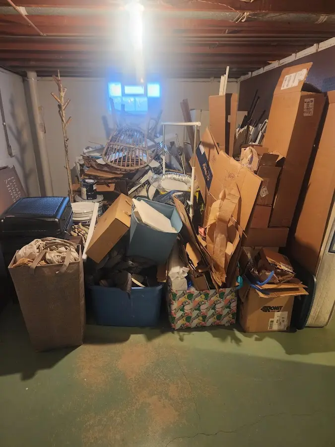 Roll-off dumpster container at job site for 2 Yard Dumpster Rental in Algona